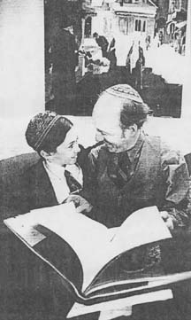 My son, my son: Moshe Rothenberg with his son, Samuel, 9. Samuel has not been circumcised.